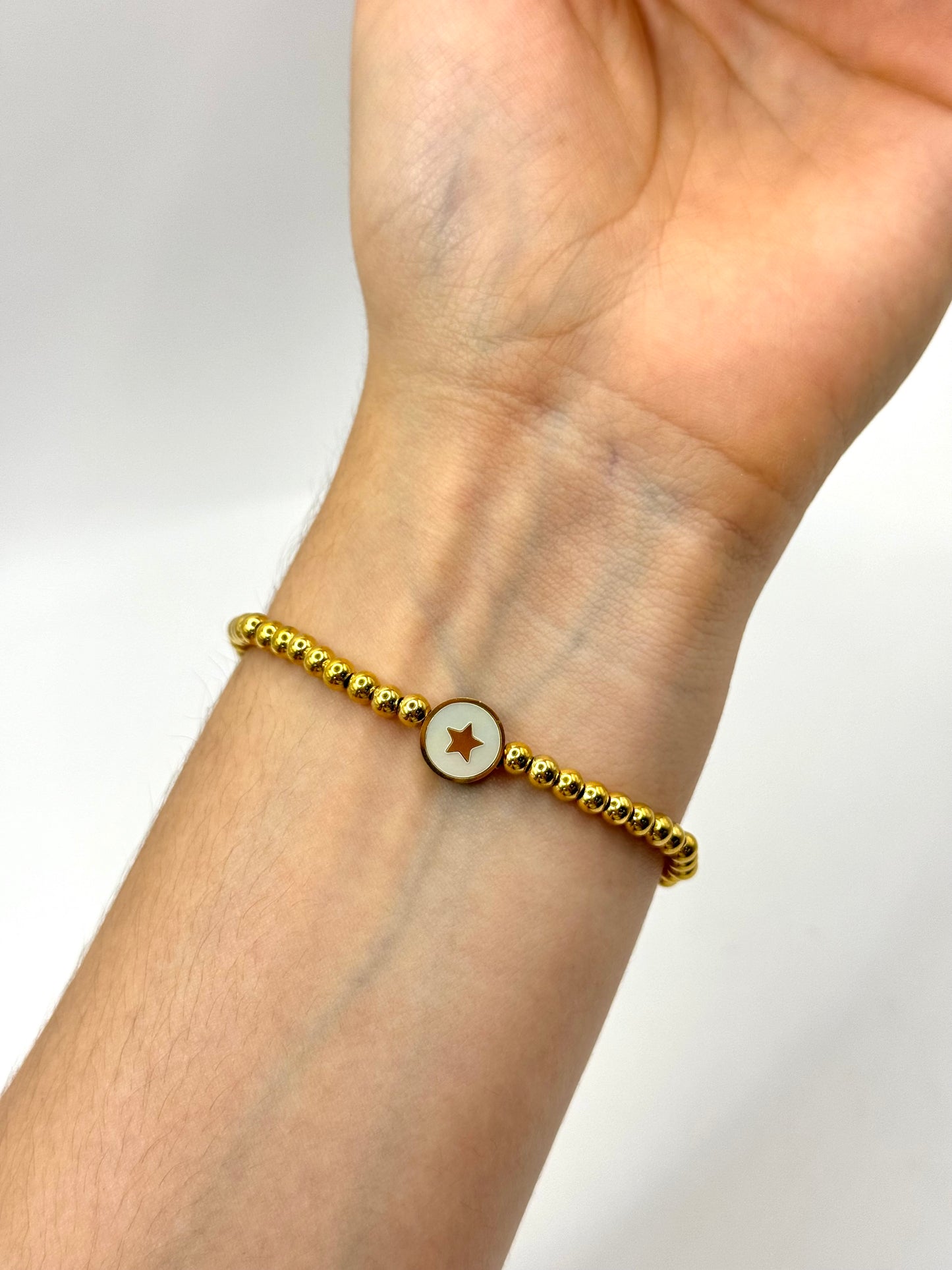 PULSERA DIJE ESTRELLA ELÁSTICA
