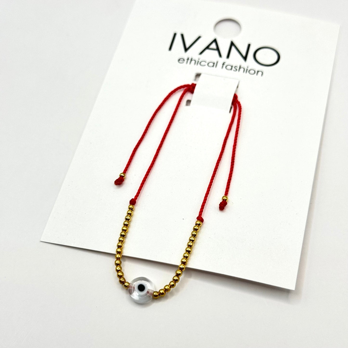 PULSERA OJO CON CHAQUIRITAS DORADAS