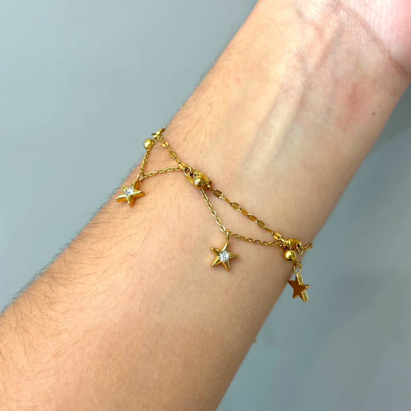 PULSERA ESTRELLAS COLGANTES
