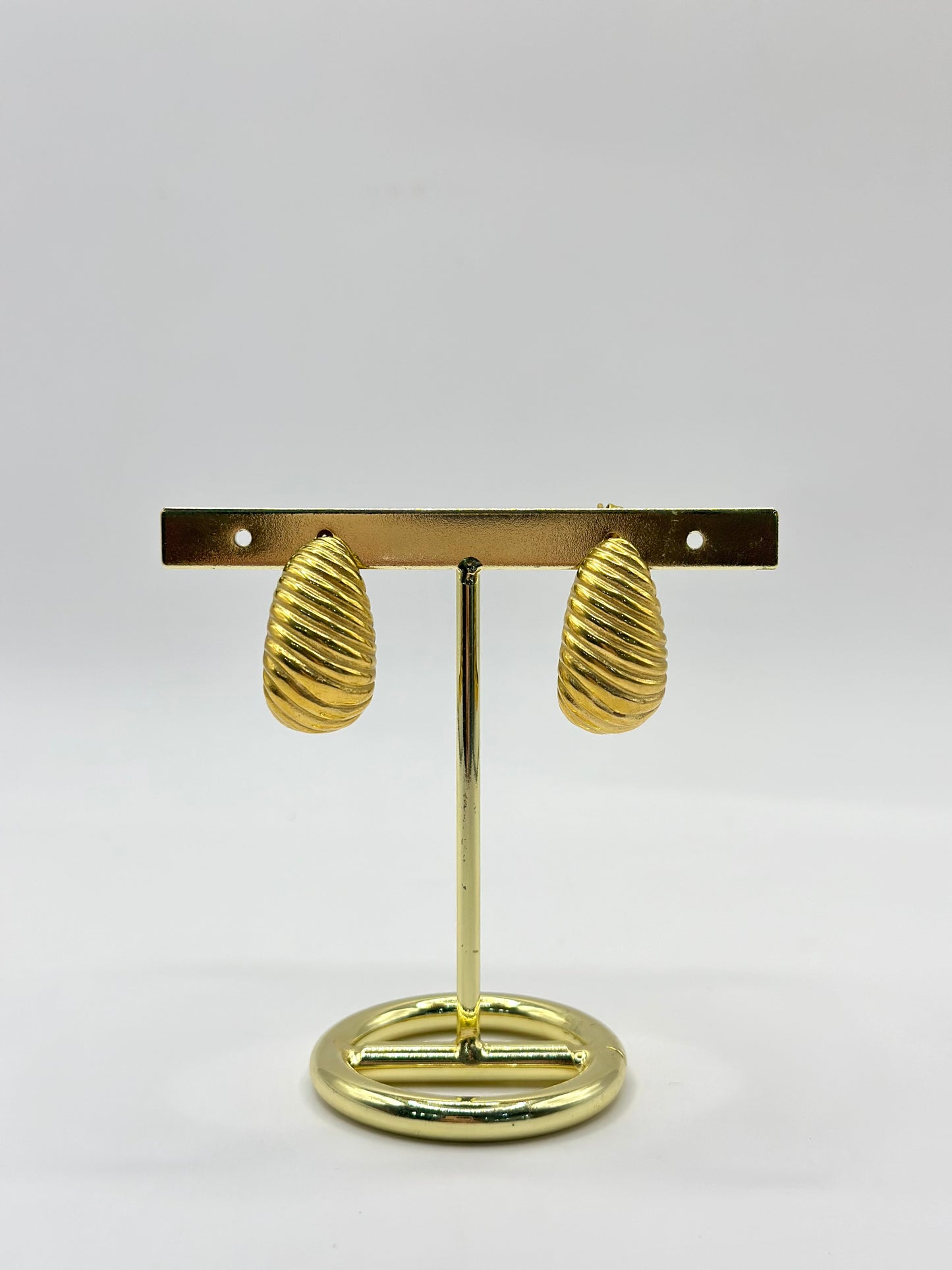 ARETE DE BOTON CON TEXTURA