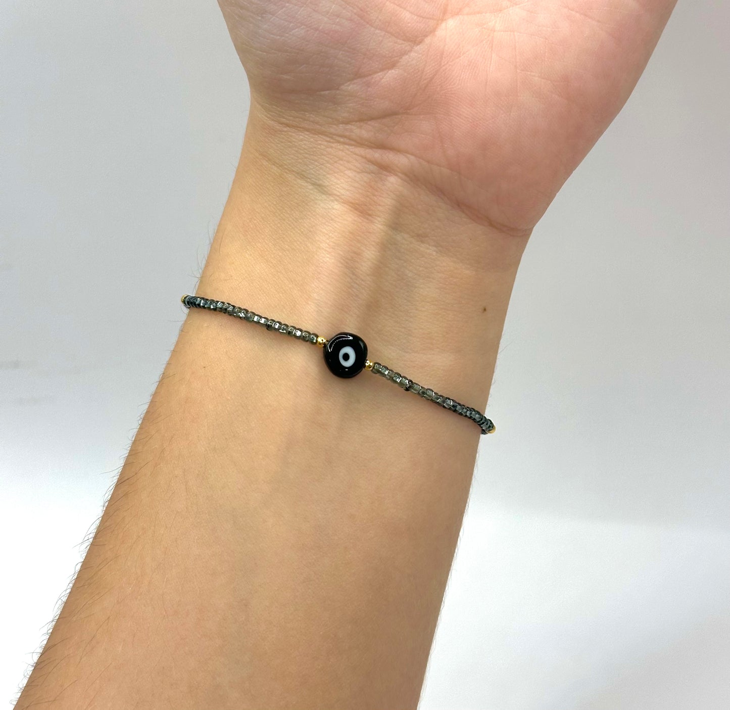 PULSERA OJO TURCO + CHAQUIRA