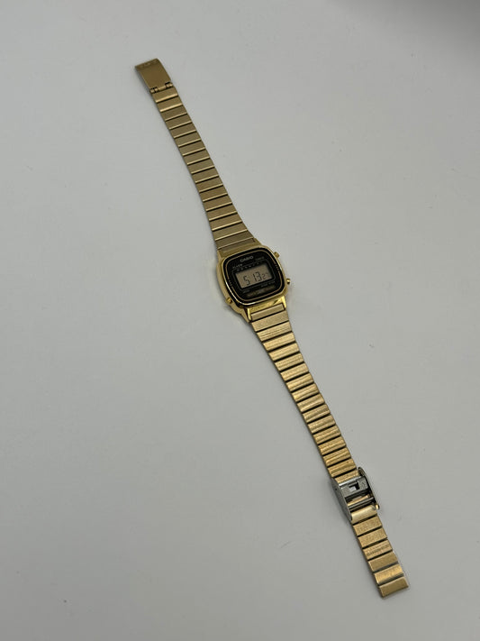 RELOJ CASIO MINI DORADO/NEGRO