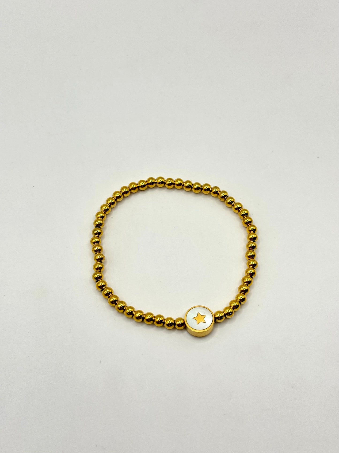 PULSERA DIJE ESTRELLA ELÁSTICA