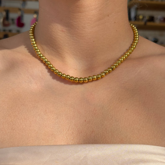 COLLAR BALINES DORADO