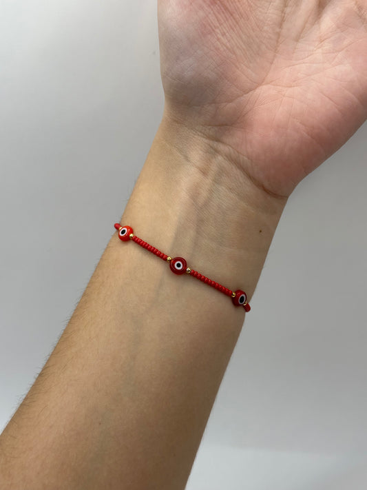 PULSERA ROJA 5 OJOS